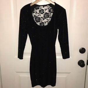 Sparkly sleeved little black dress